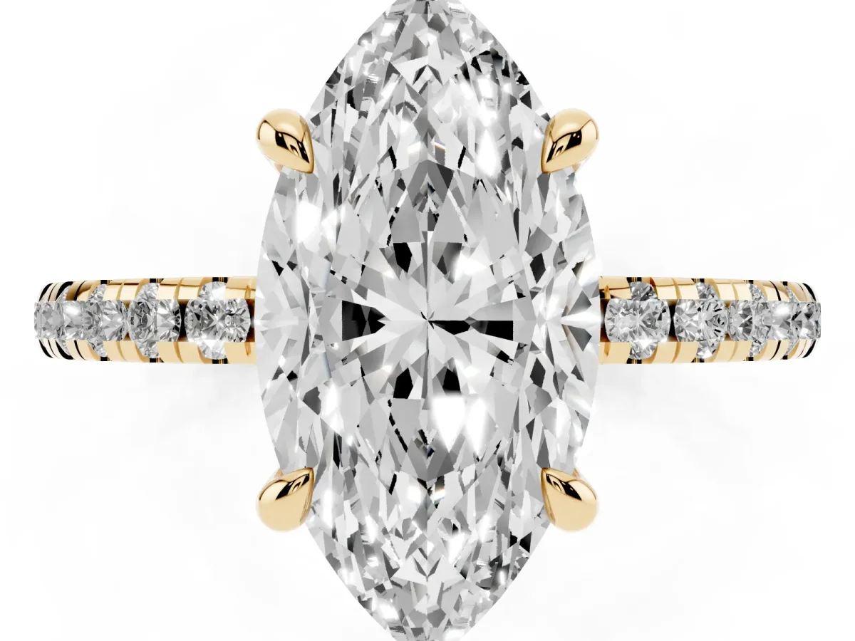 Marquise Cut Diamond Brilliant Solitaire Ring with Pavé Band and Four-Prong Setting Yellow gold