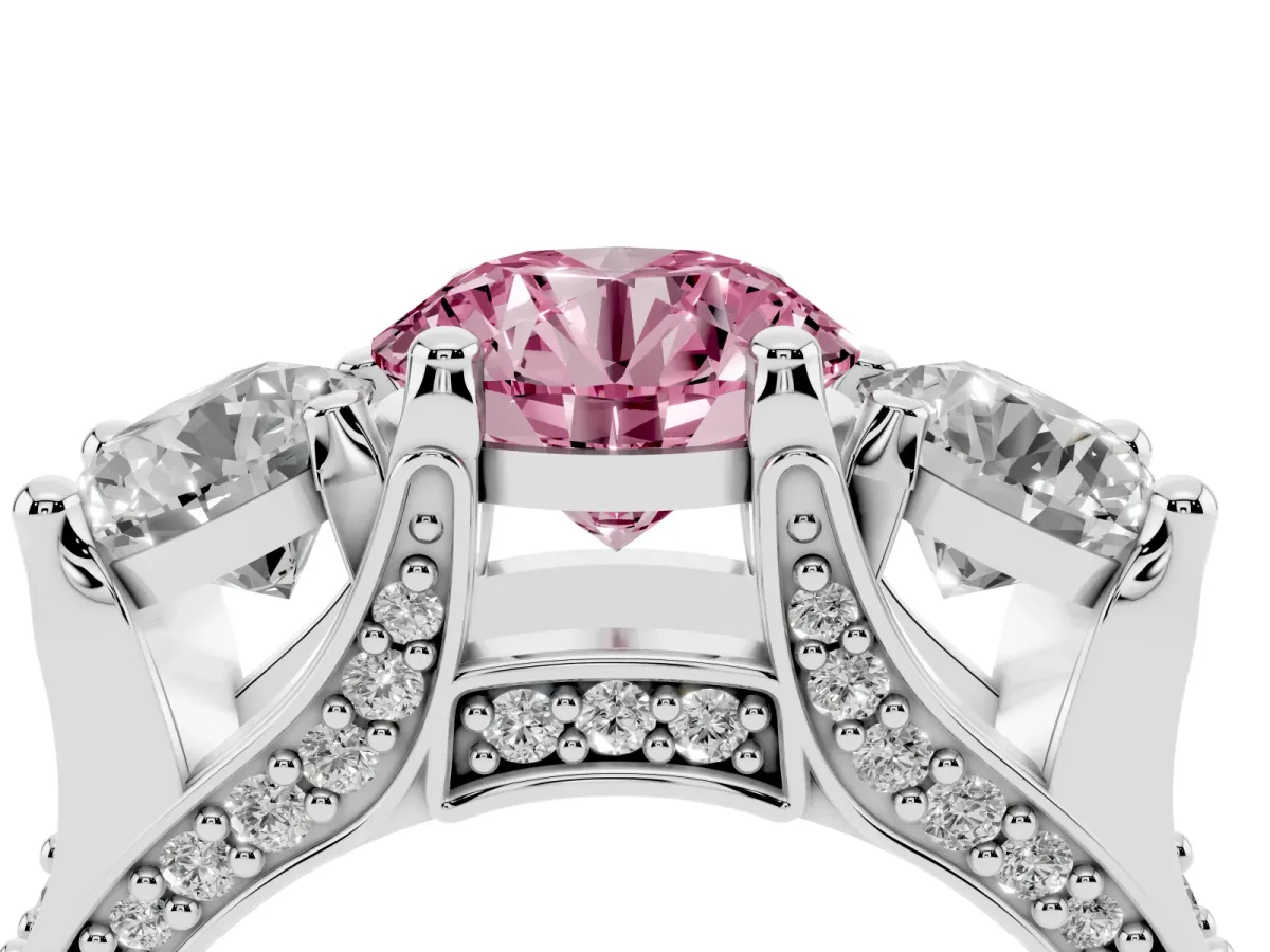 Fancy Pink Round Cut Diamond Three-Stone Ring with Channel Set Band and Four-Prong Setting Silver