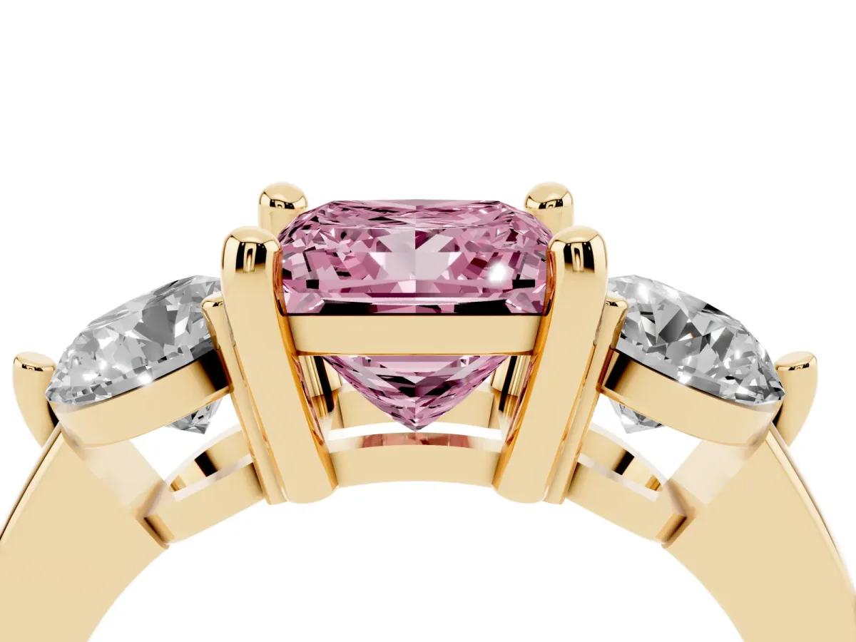 Fancy Pink Three-Stone Princess Cut Brilliant Cut Solitaire Ring with Prong Setting on a Classic Band Yellow gold