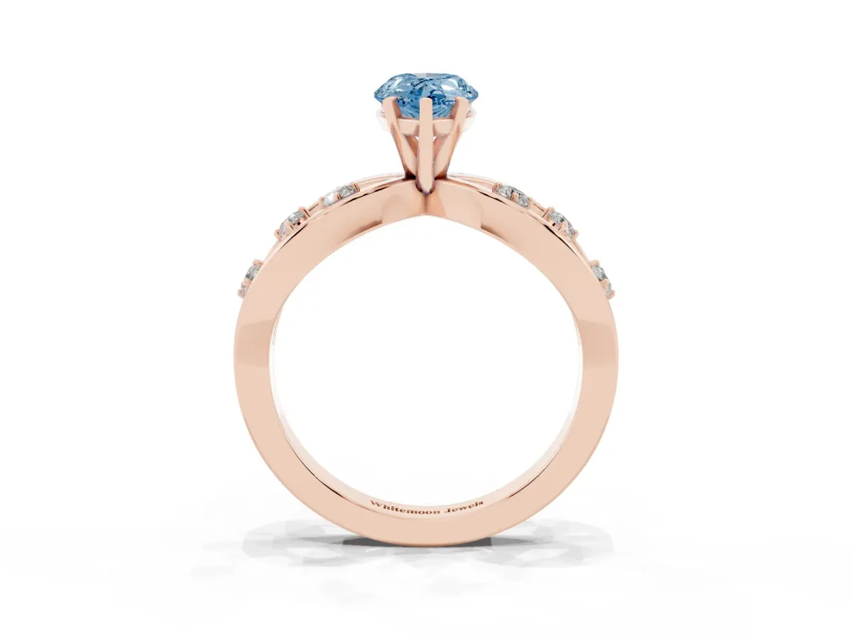Fancy Blue Pear Cut Cut Solitaire Diamond with Side Stones on Criss-Cross Band and Four-Prong Setting Rose gold