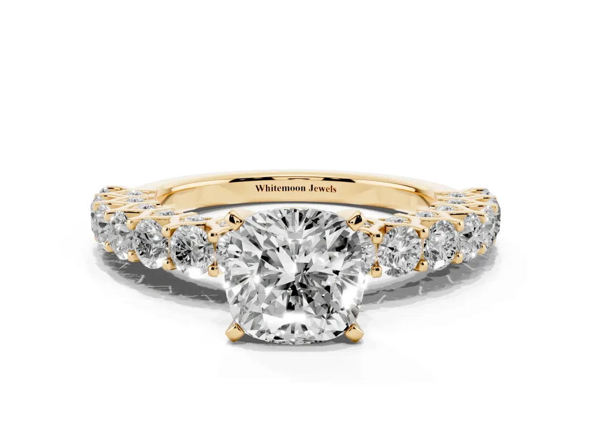 Cushion Cut Diamond Solitaire Ring with Shared Prong Pavé Band and Four-Prong Setting Yellow gold