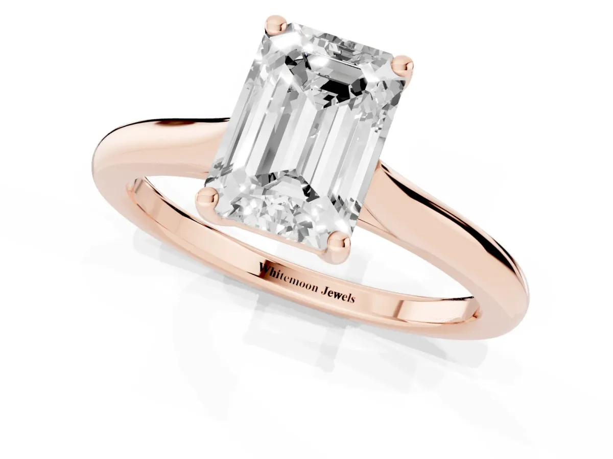 Emerald Cut Cut Solitaire Ring with Cathedral Band and Four-Prong Setting Rose gold