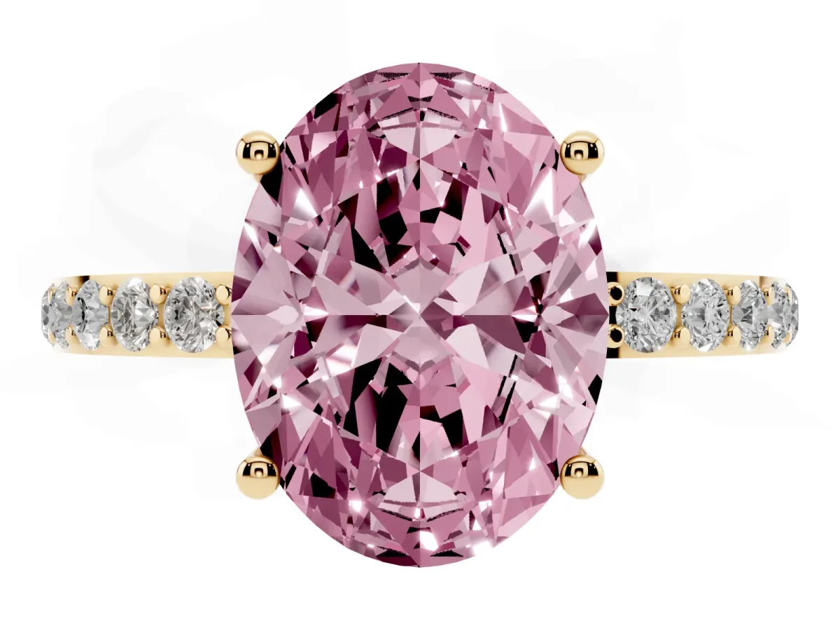 Fancy Pink Oval Cut Diamond Solitaire Ring with Round Pavé Shoulders and Prong Setting Yellow gold