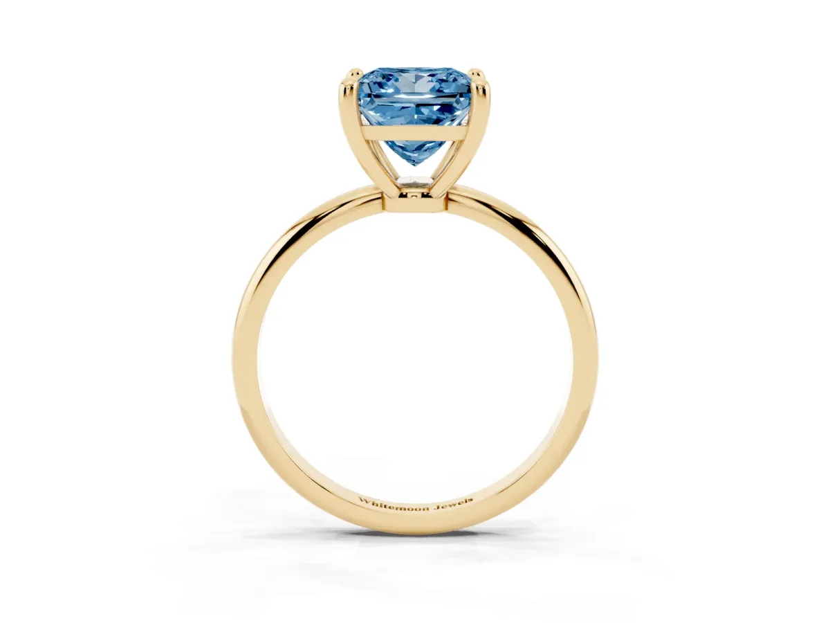 Fancy Blue Princess Cut Solitaire Diamond Ring with 4-Prong Setting on a Classic Band Yellow gold