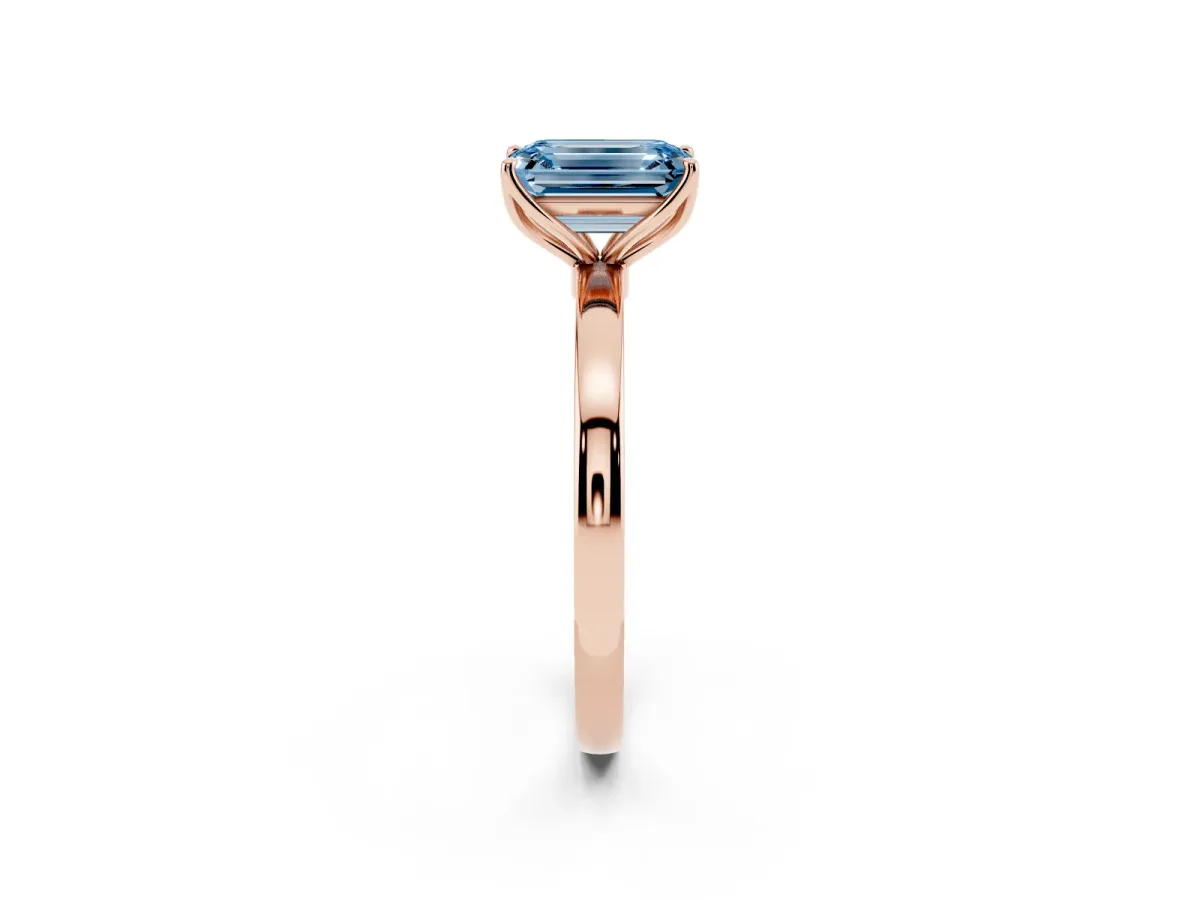 Fancy Blue Emerald Cut Diamond Solitaire Ring with Thin Band and Prong Setting Rose gold