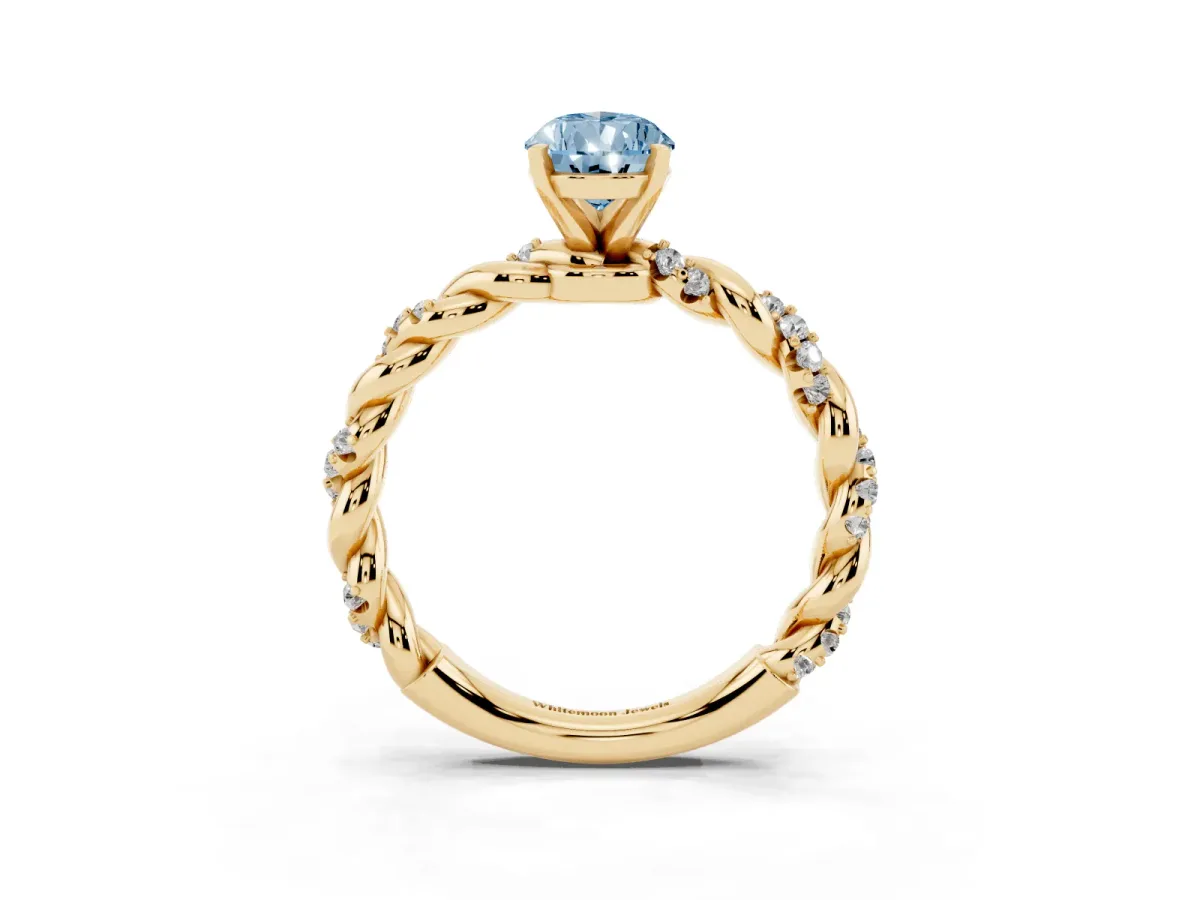 Fancy Blue Pear Cut Diamond Solitaire Ring with Twisted Band and Pavé Accents Yellow gold
