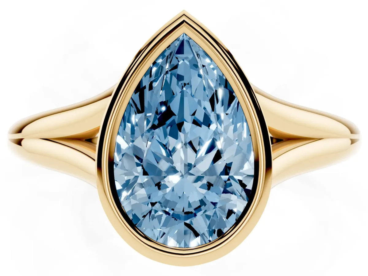 Fancy Blue Bezel Set Pear Cut Cut Solitaire Ring with Tapered Band Yellow gold