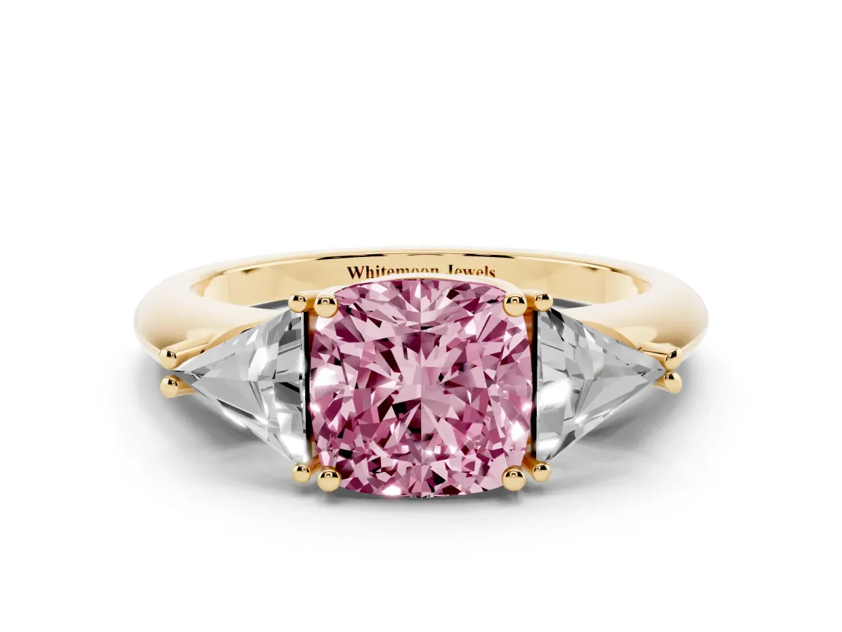 Fancy Pink Three-Stone Cushion Cut Diamond Engagement Ring with Trillion Side Stones and Prong Setting Yellow gold