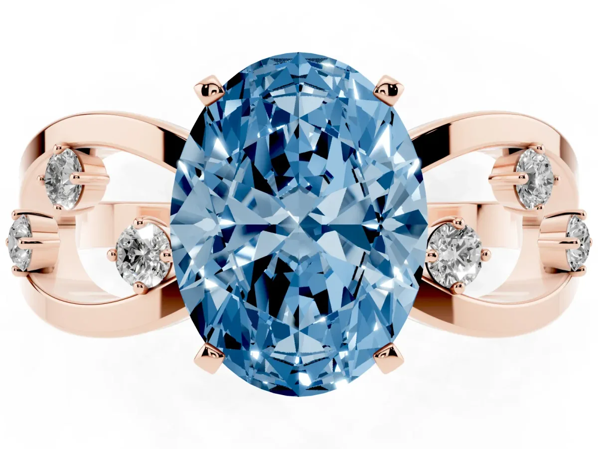 Fancy Blue Oval Cut Cut Solitaire Diamond with Side Stones on Criss-Cross Band and Four-Prong Setting Rose gold