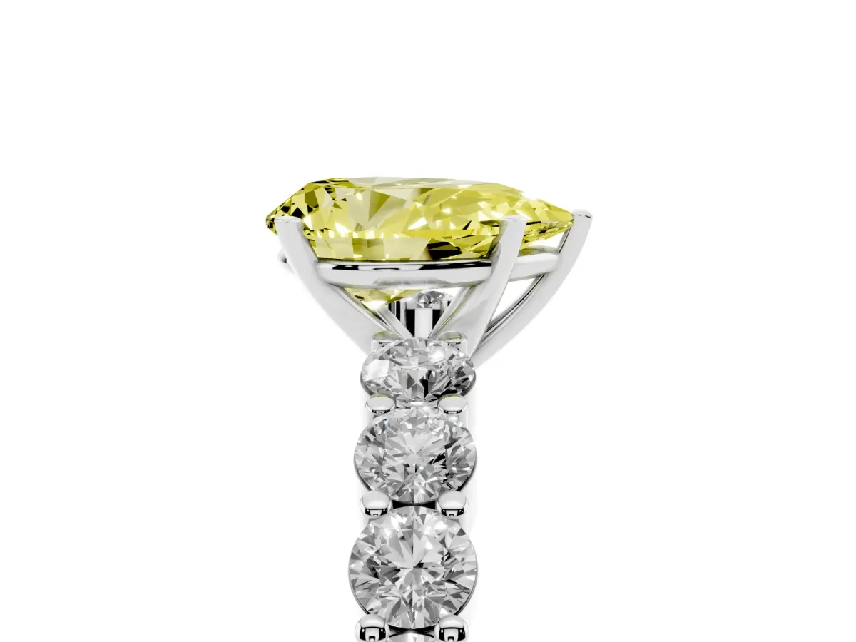 Fancy Yellow Pear Cut Diamond Solitaire Ring with Shared Prong Round Side Stones Silver