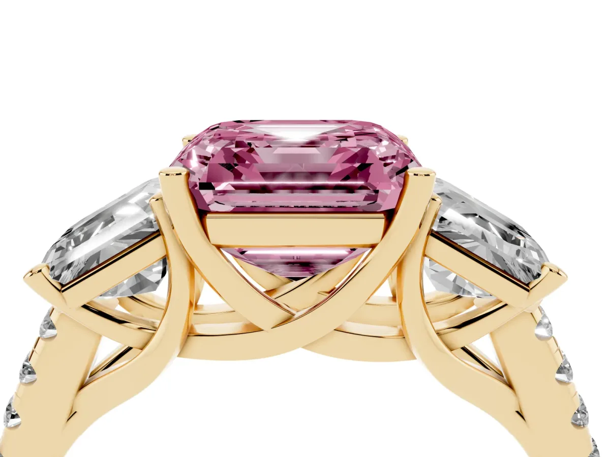 Fancy Pink Three-Stone Asscher Cut Diamond Ring with Round Pavé Band and Prong Setting Yellow gold