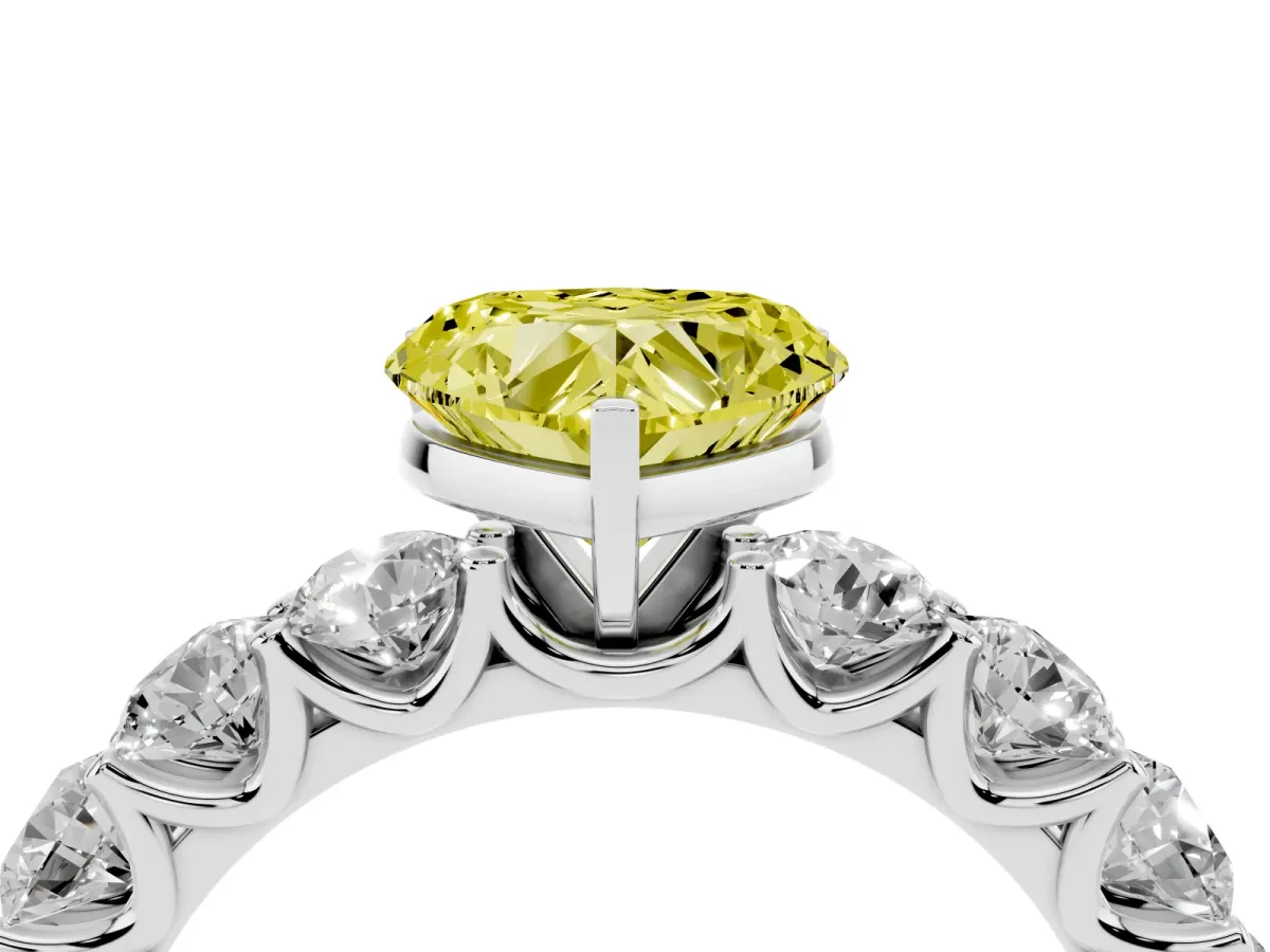 Fancy Yellow Heart Cut Diamond Prong Setting with Side Stones on a Pave Band Silver