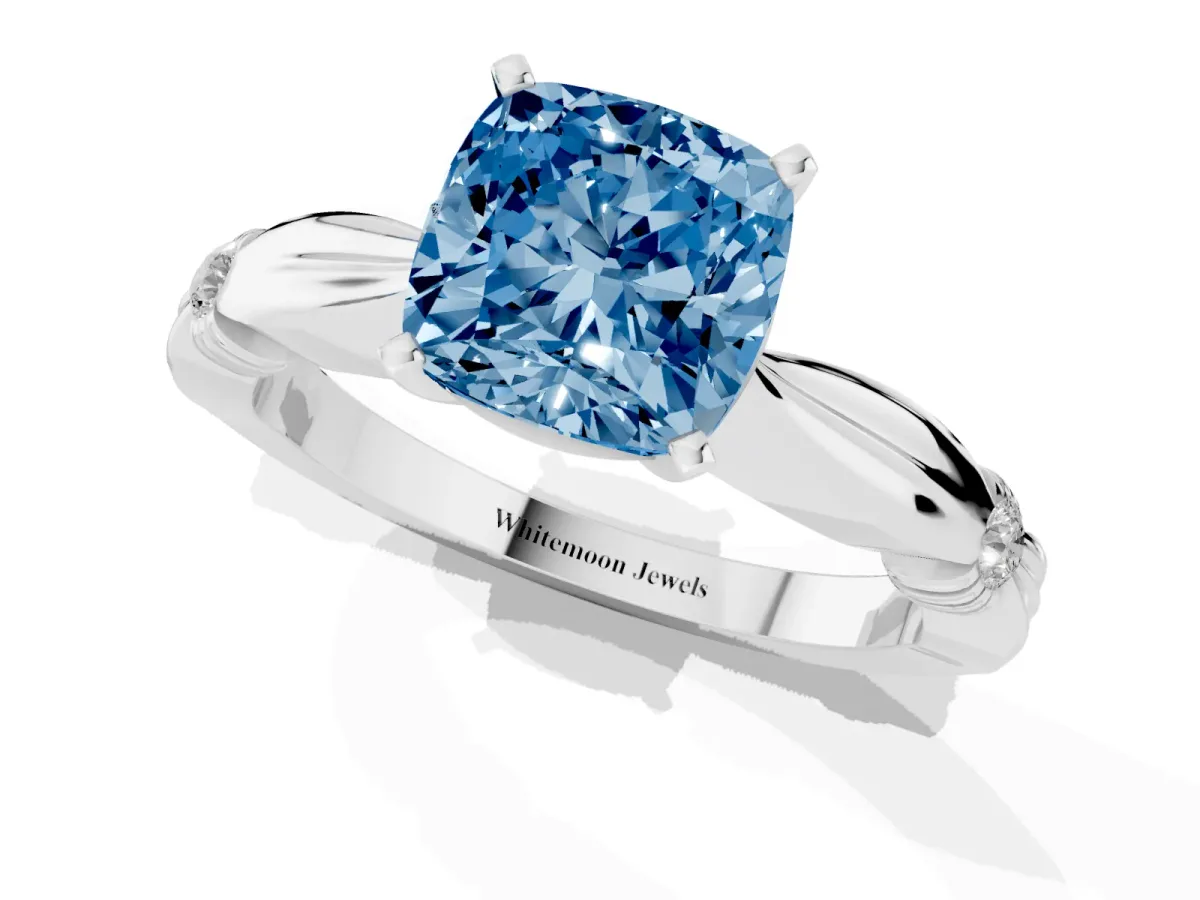 Fancy Blue Cushion Cut Solitaire Diamond Twisted Band with Four-Prong Setting Silver