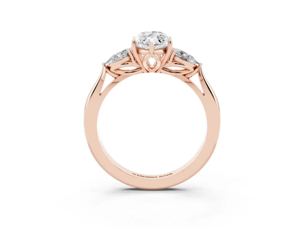Marquise Cut Diamond Three-Stone Ring with Pear Side Stones and Prong Setting Rose gold