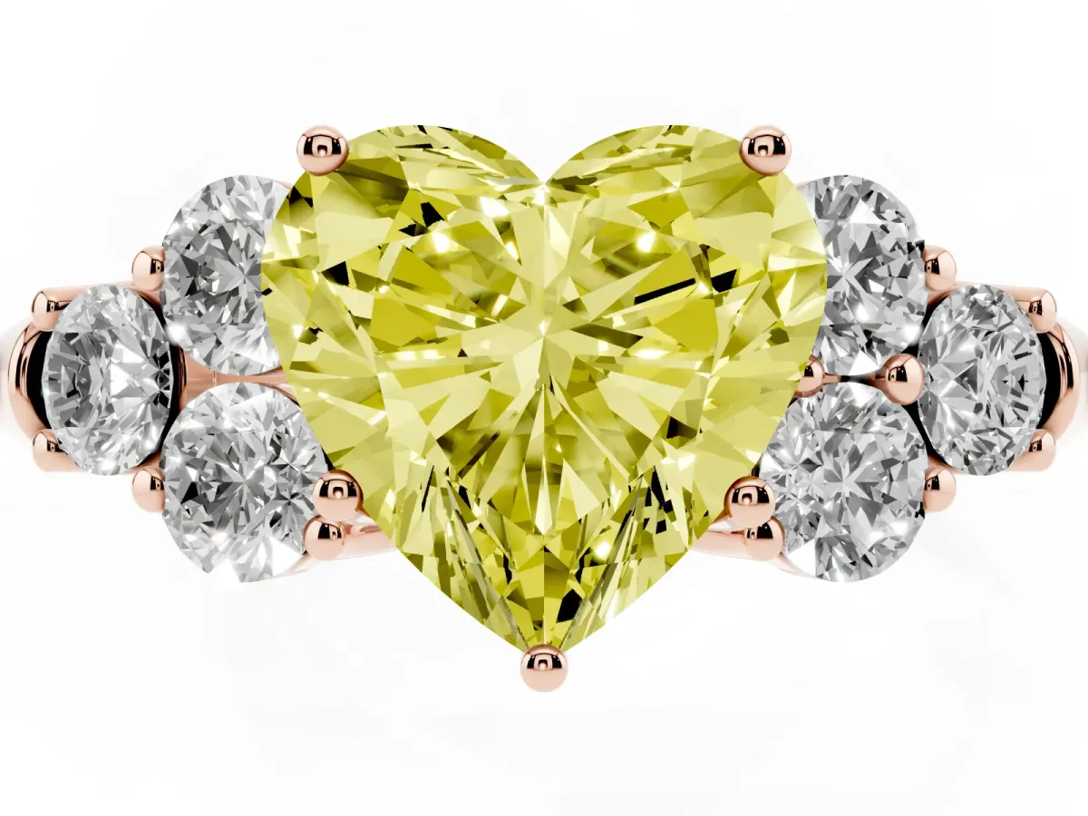 Fancy Yellow Heart Cut Cut Diamond Cluster Ring with Round Accent Stones and Prong Setting on a Classic Band Rose gold