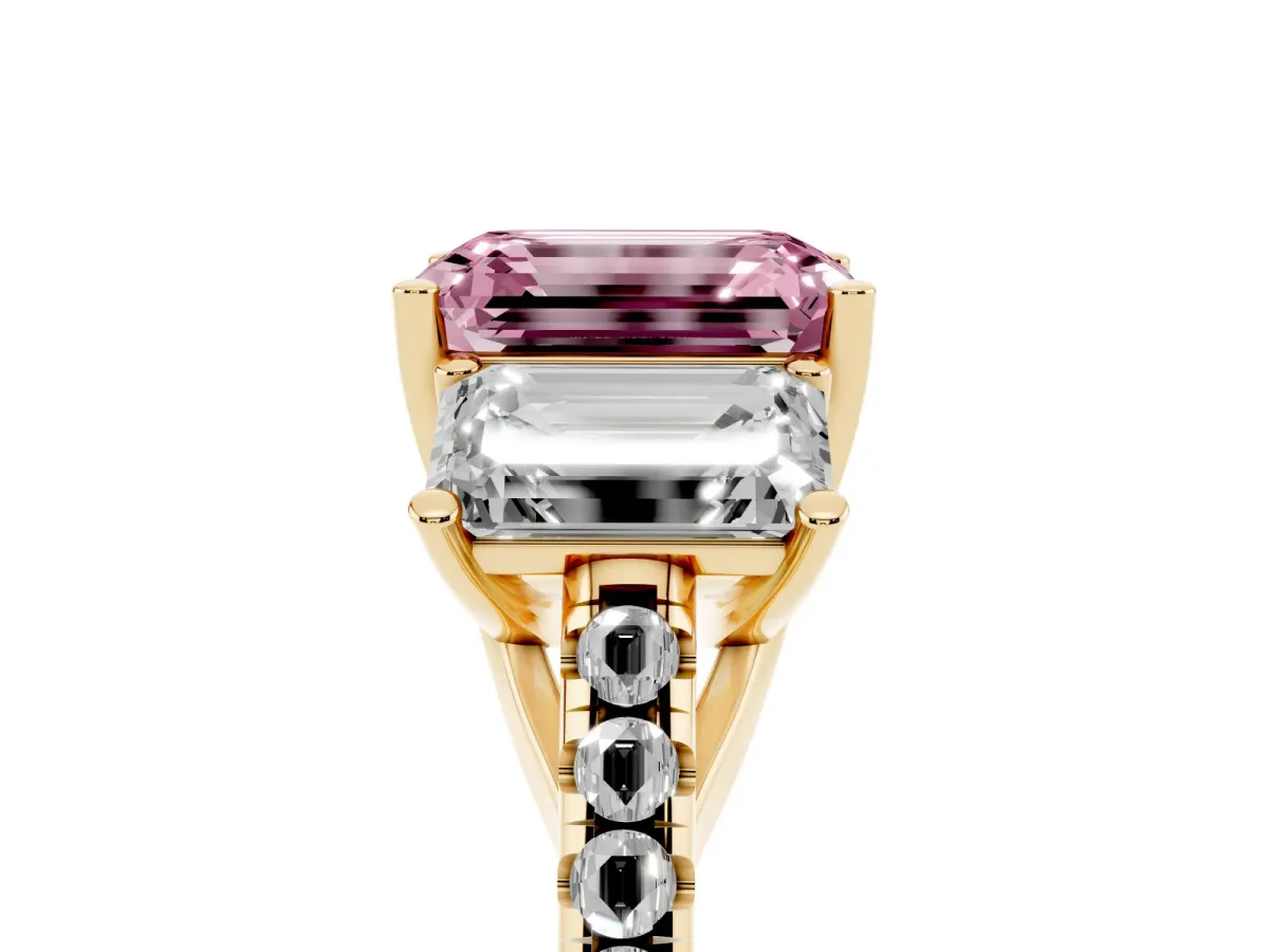 Fancy Pink Three-Stone Emerald Cut Diamond Ring with Round Pavé Band and Prong Setting Yellow gold