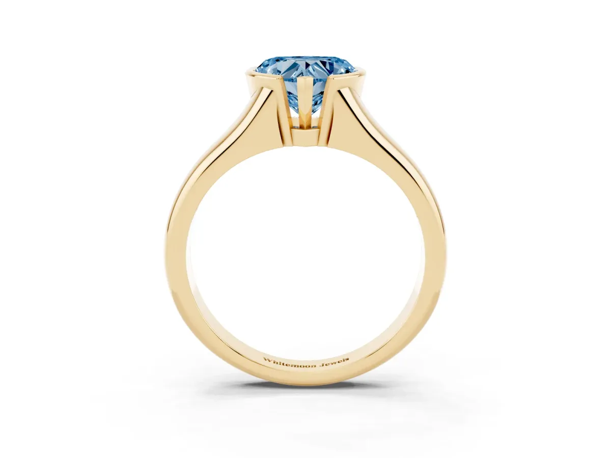 Fancy Blue Heart Cut Solitaire Tension Set Diamond Ring with Split Shank Band Yellow gold