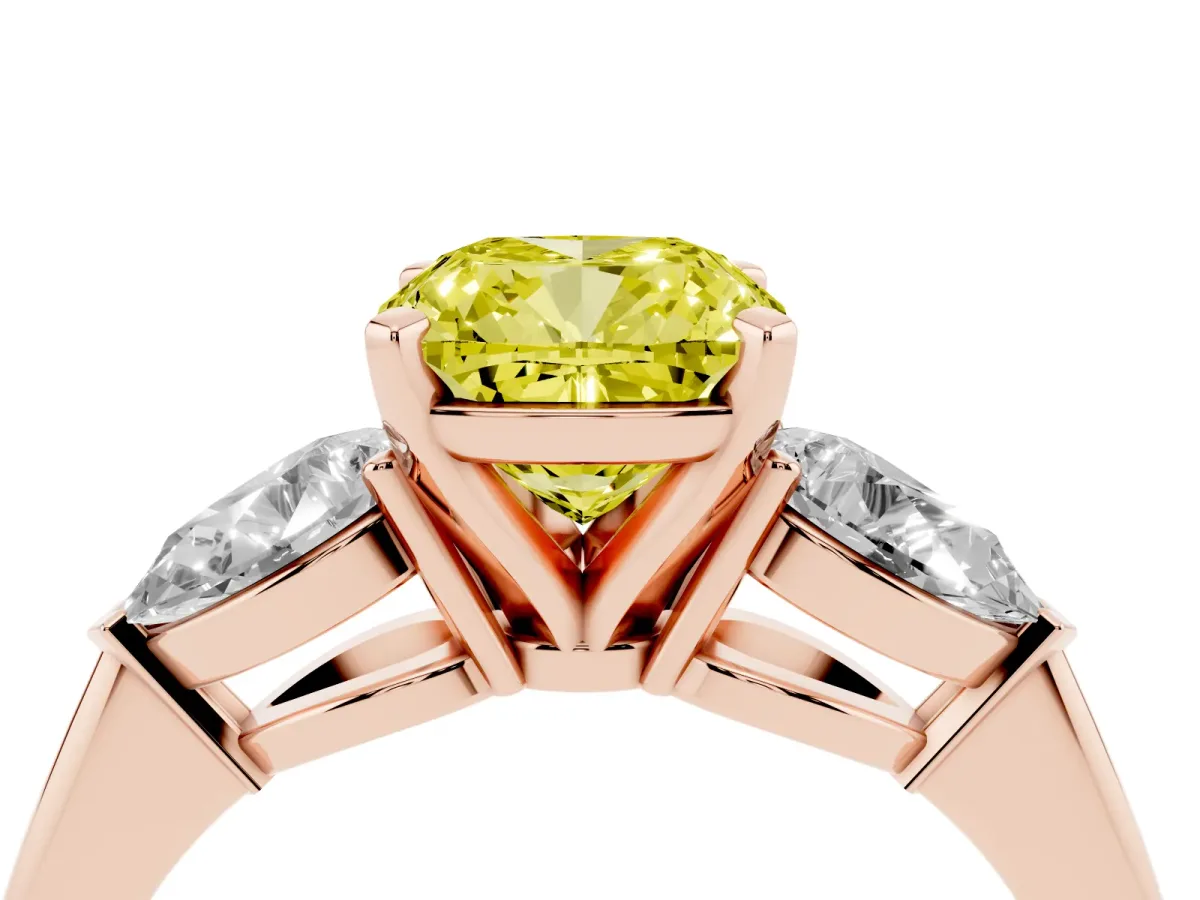 Fancy Yellow Three-Stone Cushion Cut Diamond Ring with Pear Side Stones and Four-Prong Setting Rose gold