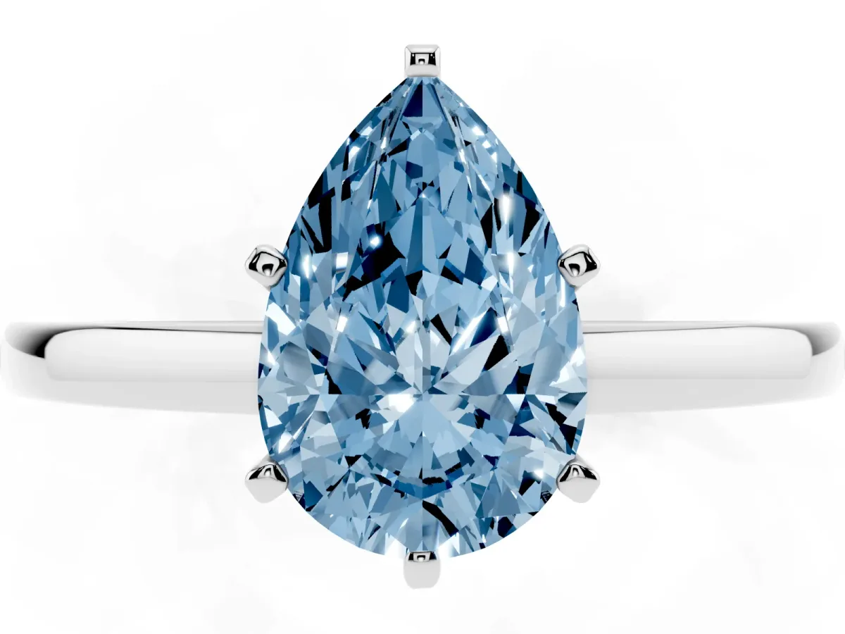 Fancy Blue Pear Cut Solitaire Diamond Engagement Ring with Four-Prong Setting on a Classic Band Silver