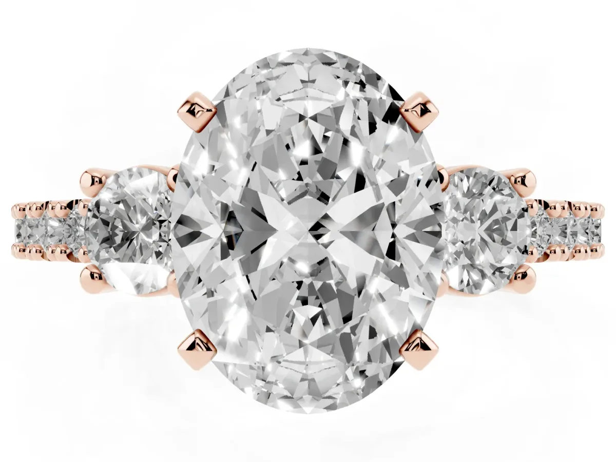 Oval Cut Three-Stone Diamond Pavé Band with Prong Setting Rose gold