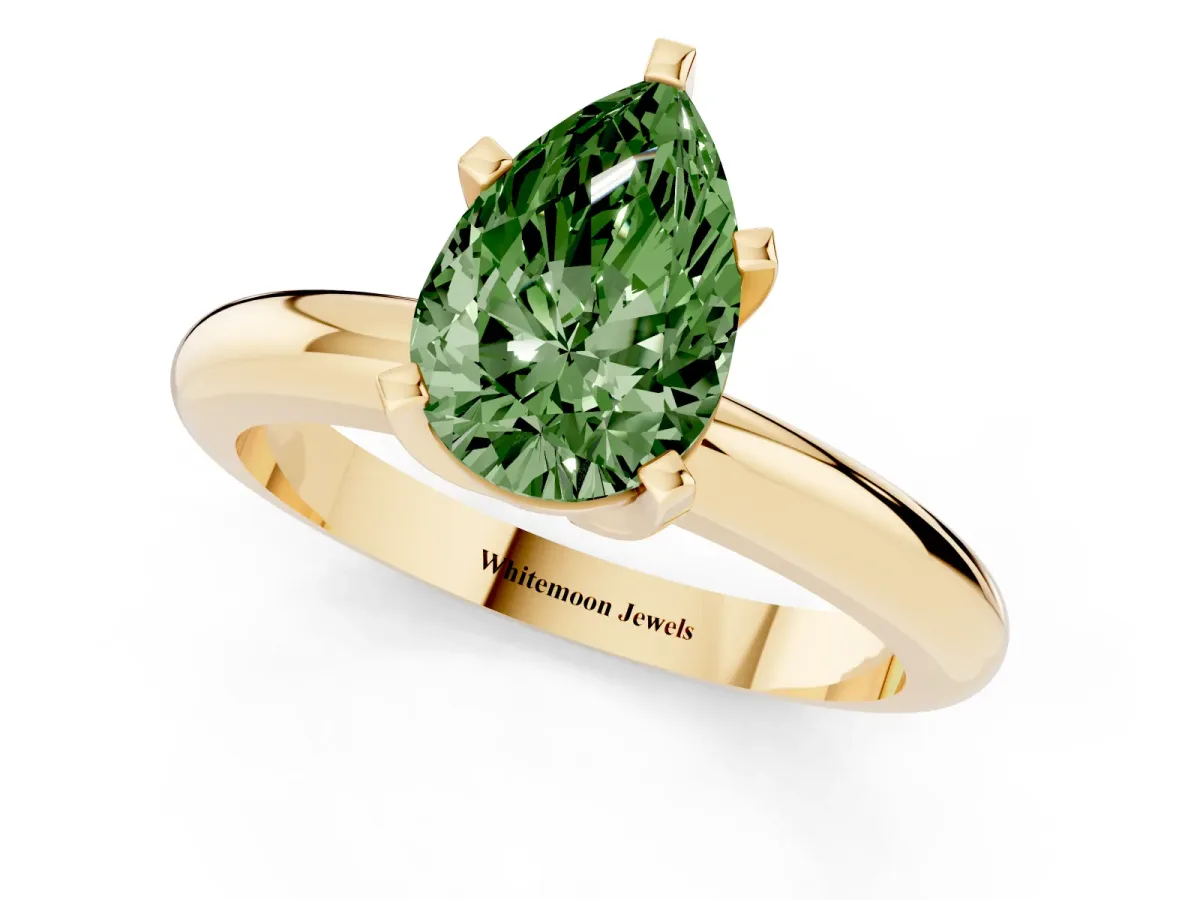 Fancy Green Pear Cut Diamond Solitaire Engagement Ring with Round Band and Four-Prong Setting Yellow gold