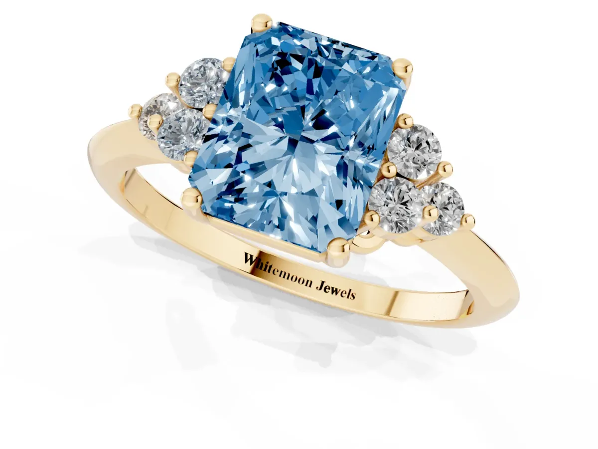 Fancy Blue Radiant Cut Cut Diamond Cluster Ring with Solitaire Band and Four-Prong Setting Yellow gold