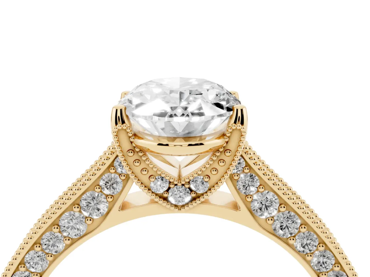 Oval Cut Cut Diamond Solitaire Ring with Milgrain Pave Band and Four Prong Setting Yellow gold