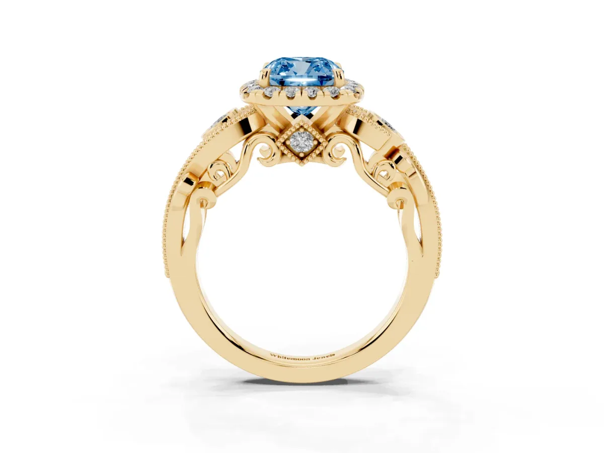 Fancy Blue Cushion Cut Halo Diamond Ring with Milgrain and Bezel Accents on a Split Shank Band Yellow gold
