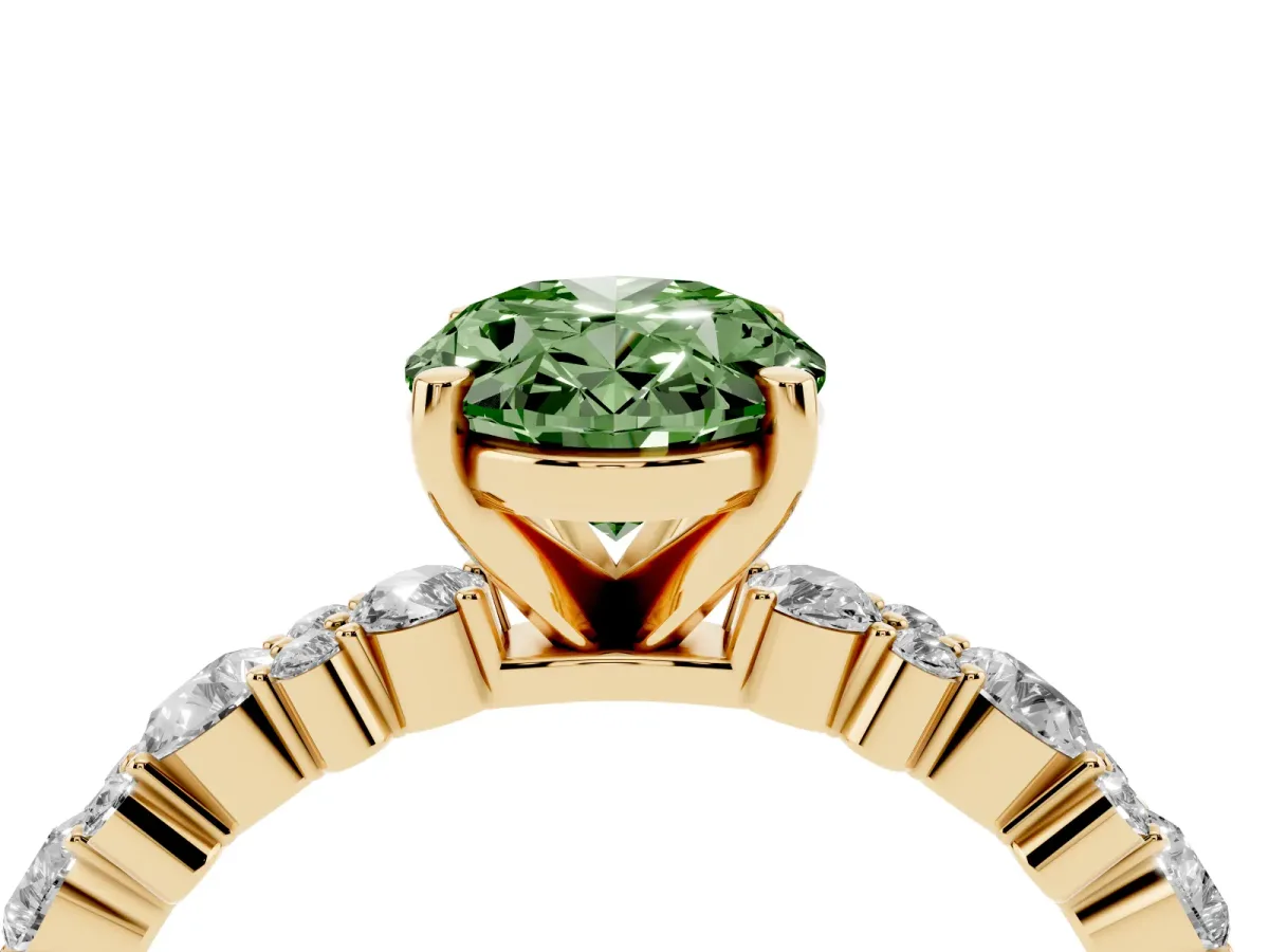 Fancy Green Oval Cut Diamond Side Stone Solitaire Ring with Round and Four-Prong Setting Yellow gold