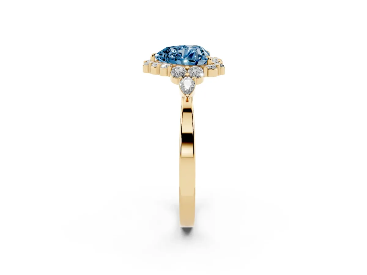 Fancy Blue Heart Cut Diamond Halo Ring with Pear Side Stones and Prong Setting Yellow gold