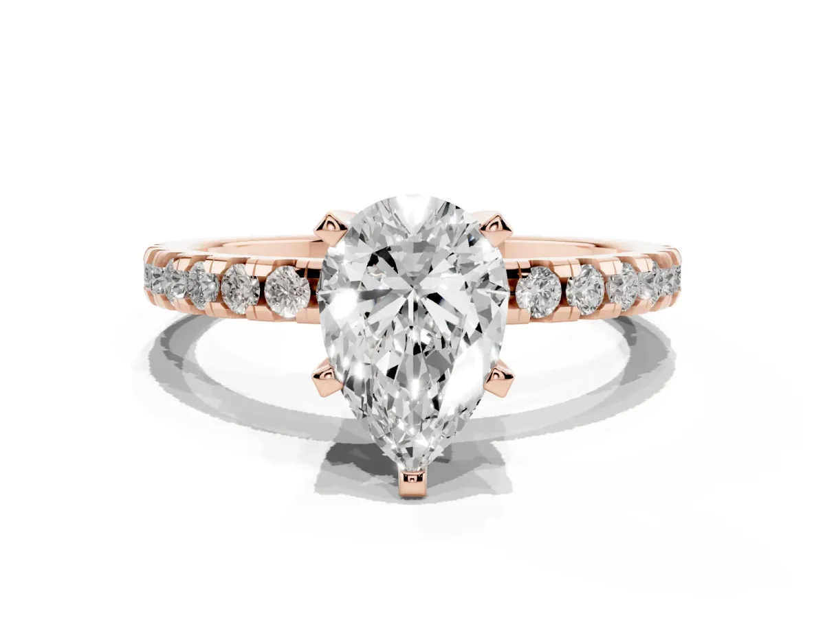 Pear Cut Diamond Solitaire Ring with Round Pavé Band and Four-Prong Setting Rose gold