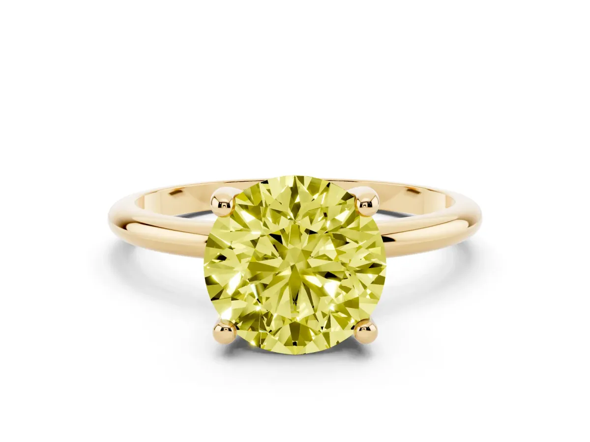 Fancy Yellow Round Cut Solitaire Diamond Ring with 4-Prong Setting on a Classic Band Yellow gold
