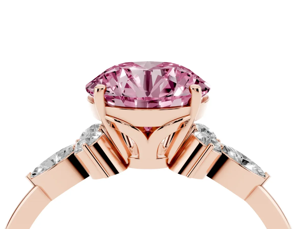 Fancy Pink Round Cut Brilliant Diamond Solitaire Ring with Pear Side Stones and Four-Prong Setting Rose gold
