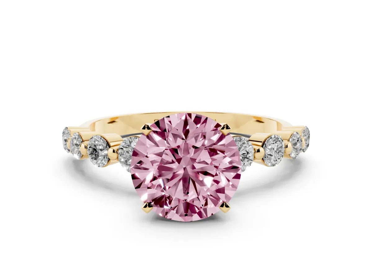 Fancy Pink Round Cut Solitaire Diamond Ring with Pave Band and Four-Prong Setting Yellow gold