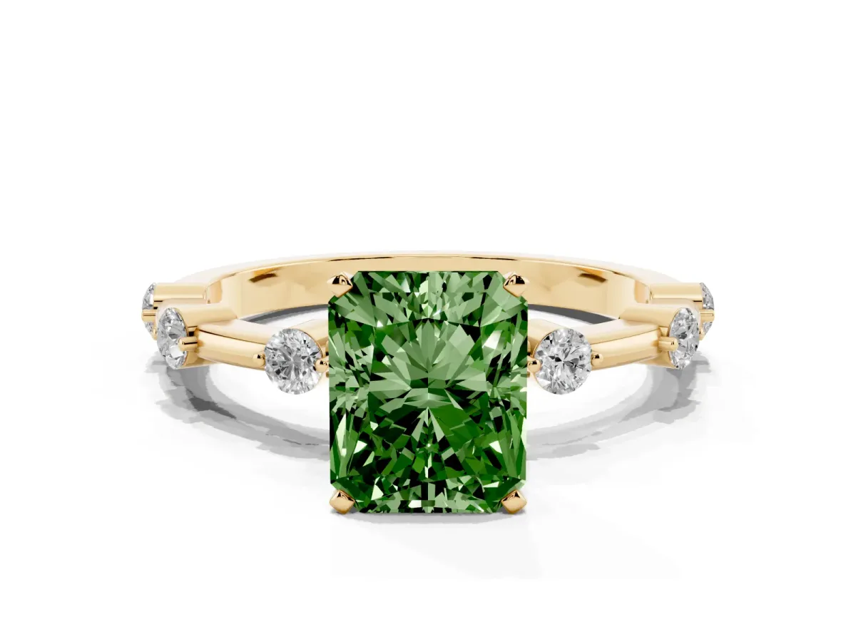 Fancy Green Radiant Cut Solitaire Diamond Ring with Bezel Set Side Stones and Prong Setting Yellow gold