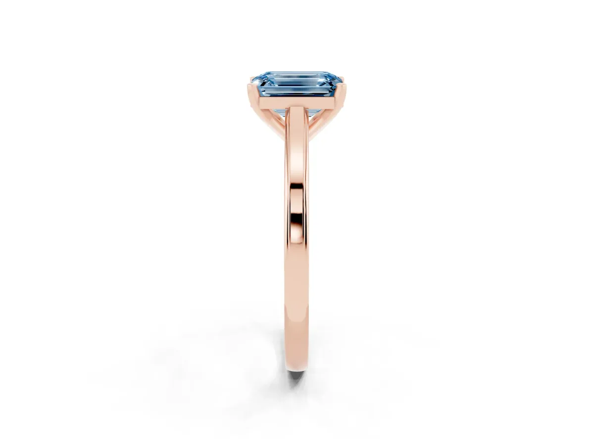 Fancy Blue Emerald Cut Solitaire Diamond Ring with Four-Prong Setting and Classic Band Rose gold