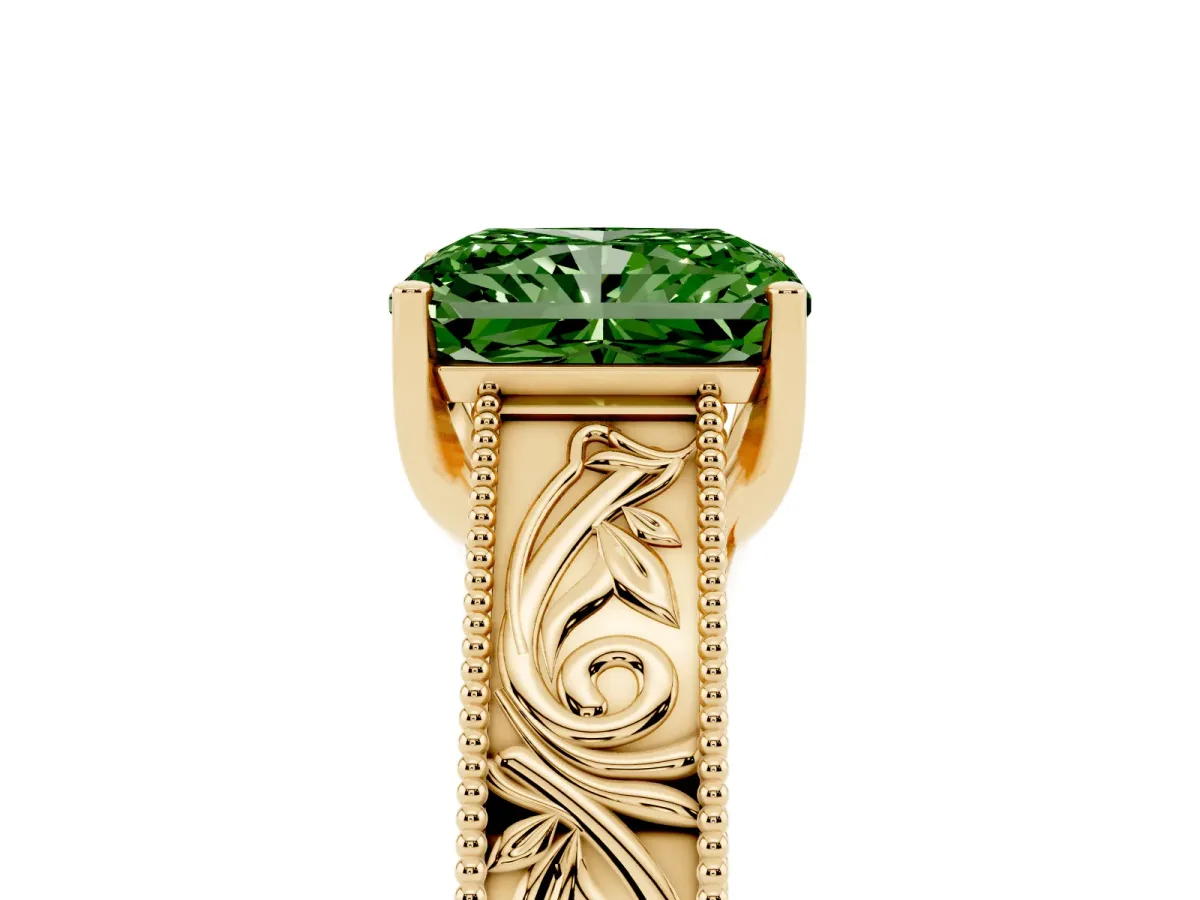 Fancy Green Radiant Cut Diamond Solitaire Ring with Engraved Band and Four-Prong Setting Yellow gold