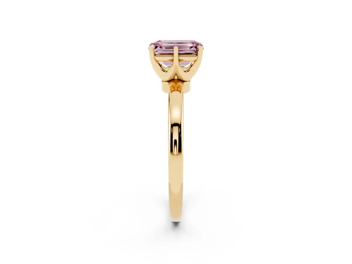 Fancy Pink Emerald Cut Solitaire Diamond Ring with Six-Prong Setting on a Classic Band Yellow gold