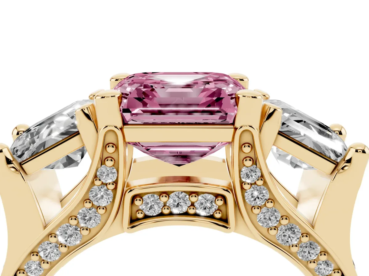 Fancy Pink Asscher Cut Diamond Three-Stone Ring with Channel Set Band and Four-Prong Setting Yellow gold