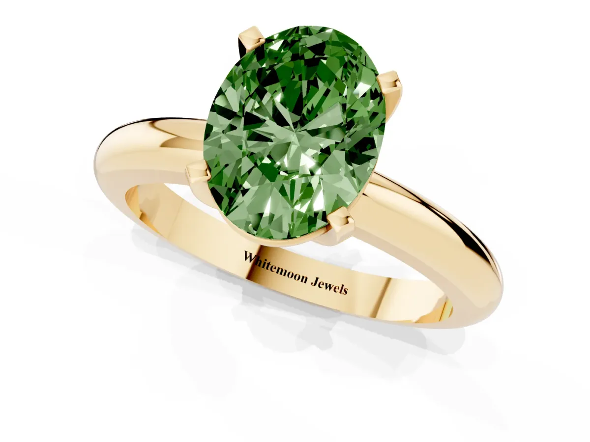 Fancy Green Oval Cut Diamond Solitaire Engagement Ring with Round Band and Four-Prong Setting Yellow gold