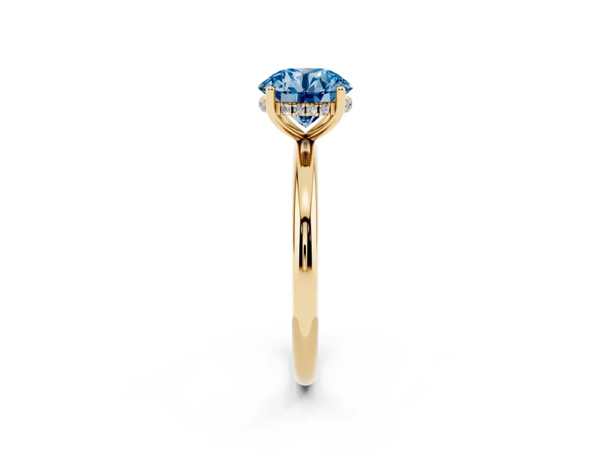 Fancy Blue Round Cut Cut Solitaire Engagement Ring with Four-Prong Setting and Classic Band Yellow gold