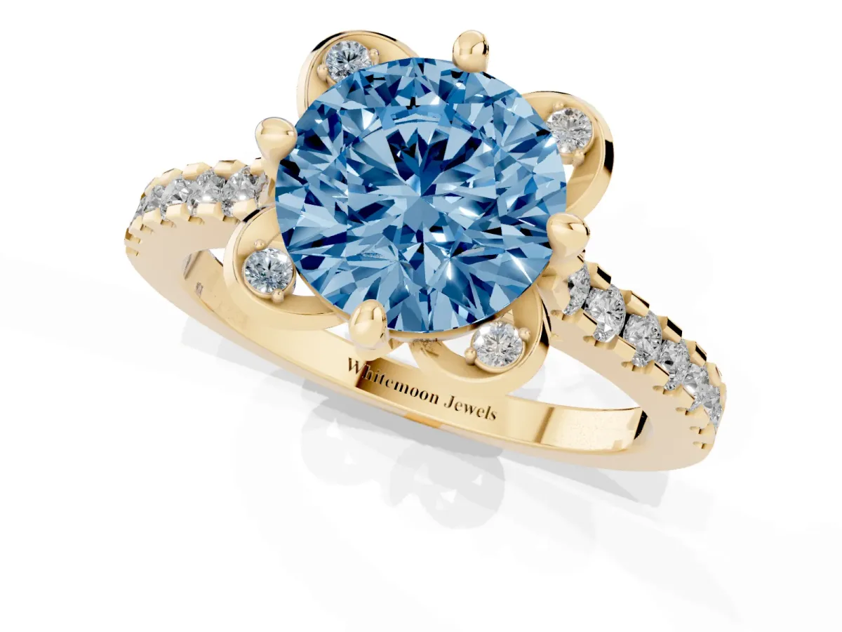 Fancy Blue Round Cut Diamond Ring with Pavé Band and Floral Prong Setting Yellow gold