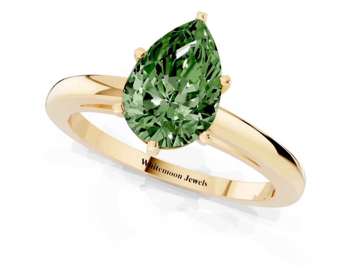 Fancy Green Pear Cut Solitaire Diamond Engagement Ring with Four-Prong Setting on a Classic Band Yellow gold