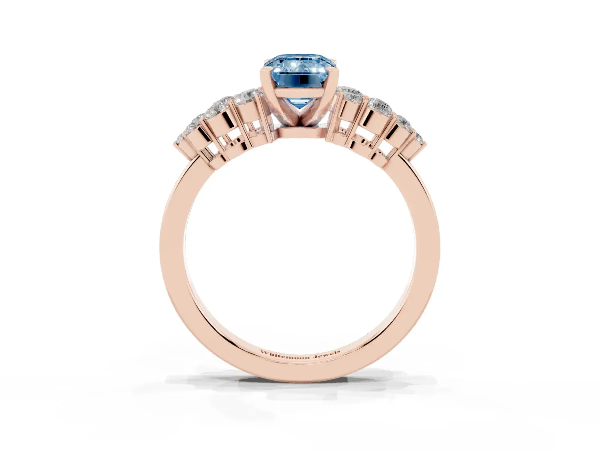 Fancy Blue Emerald Cut Cluster Diamond Engagement Ring with Pavé Band and Four-Prong Setting Rose gold