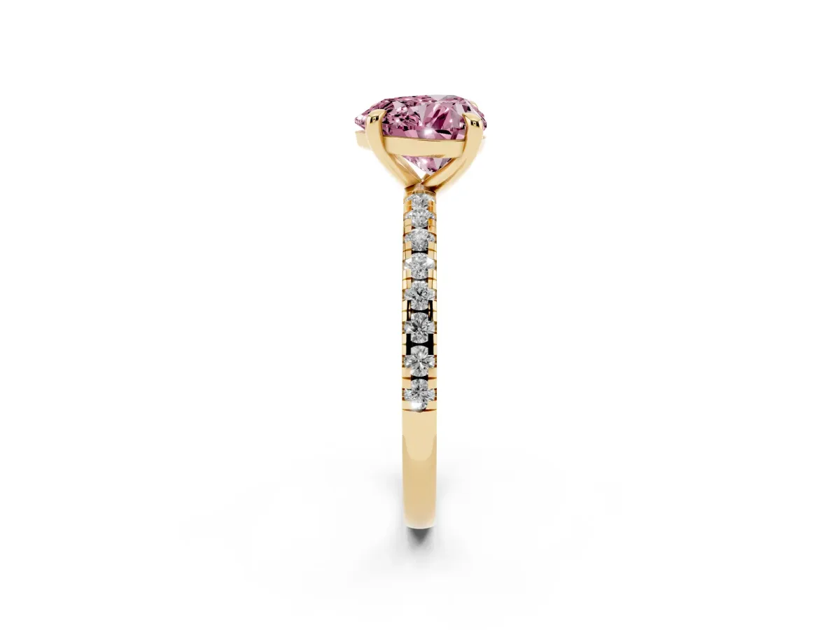 Fancy Pink Heart Cut Diamond Brilliant Solitaire Ring with Pavé Band and Four-Prong Setting Yellow gold