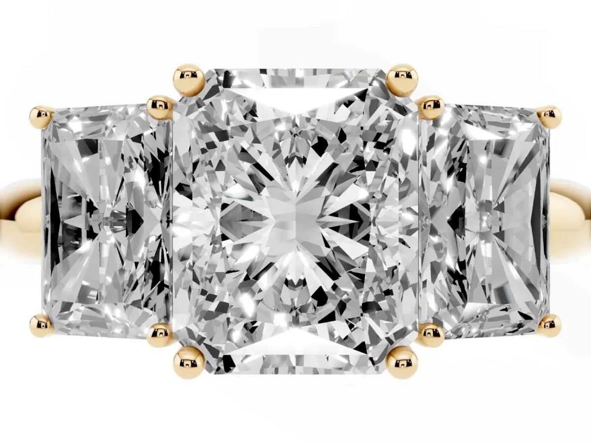Three-Stone Radiant Cut Cut Diamond Engagement Ring with Prong Setting on a White Gold Band Yellow gold