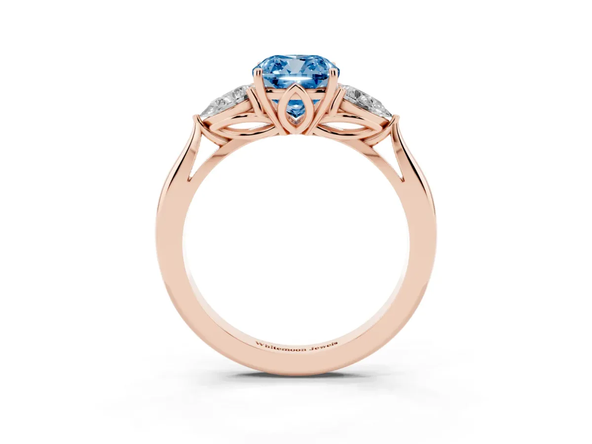 Fancy Blue Three-Stone Cushion Cut Brilliant Diamond Solitaire Ring with Tapered Band and Four-Prong Setting Rose gold