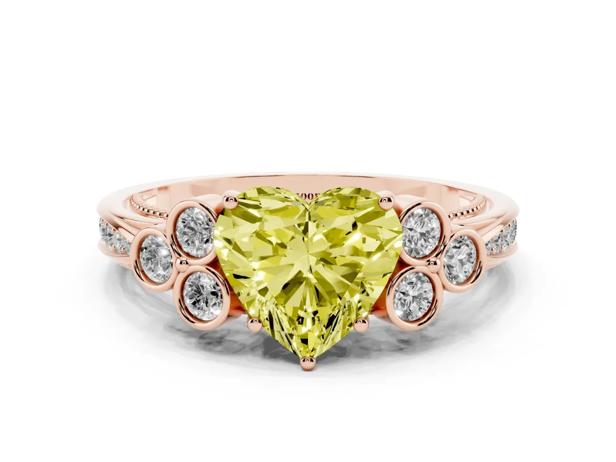 Fancy Yellow Heart Cut Cut Diamond Engagement Ring with Bezel Set Round Side Stones and Prong Setting Rose gold