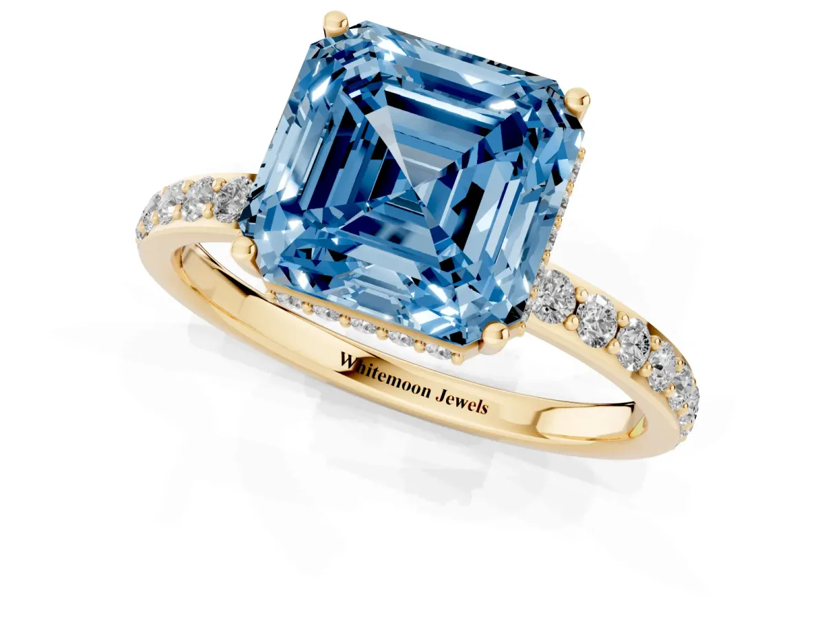 Fancy Blue Asscher Cut Diamond Solitaire Ring with Pavé Band and Hidden Halo Yellow gold