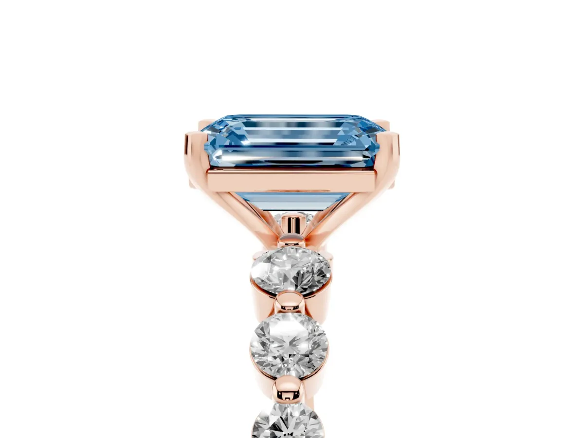 Fancy Blue Emerald Cut Solitaire Diamond Ring with Pave Band and Four-Prong Setting Rose gold